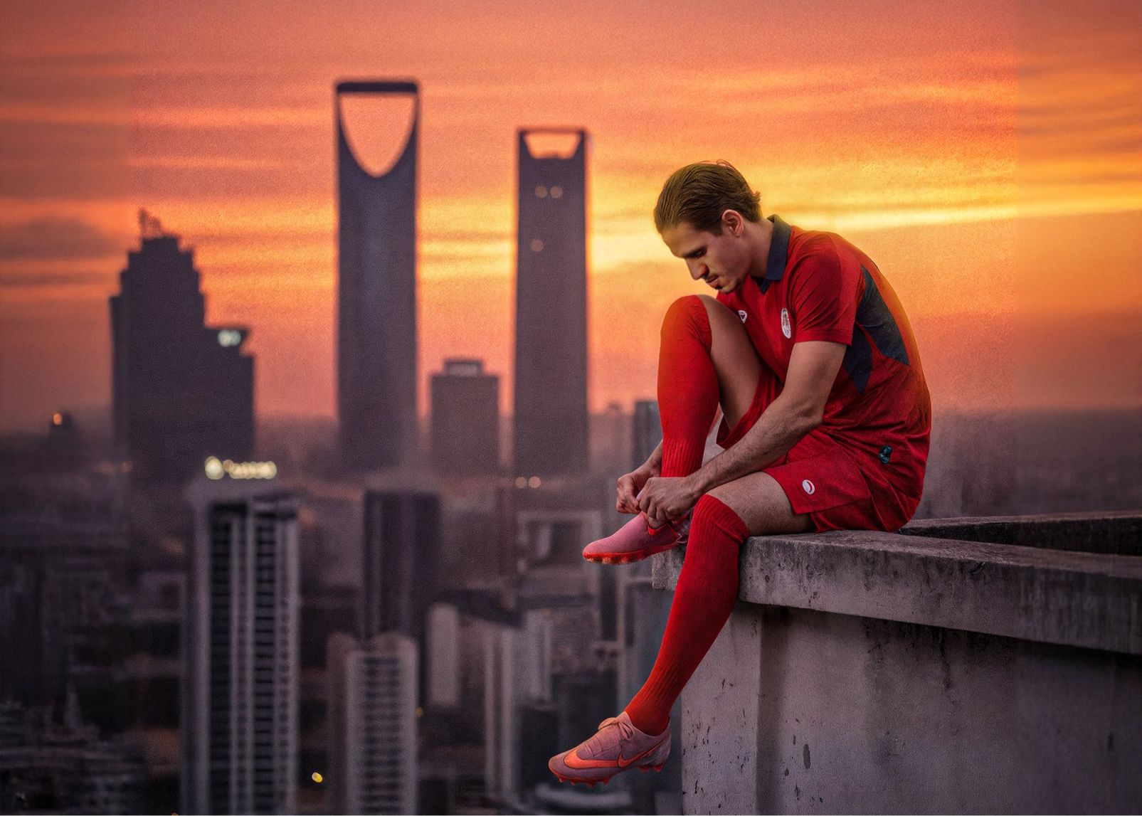 Représentation réaliste ou abstraction ? Affiche officielle DAMAC : Les joueurs s'assoient au bord du toit pour attacher leurs lacets